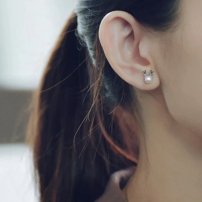 Reindeer Pearl Stud Earrings™